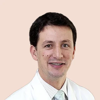 Dr(a). Patrick Frensel Tzelikis